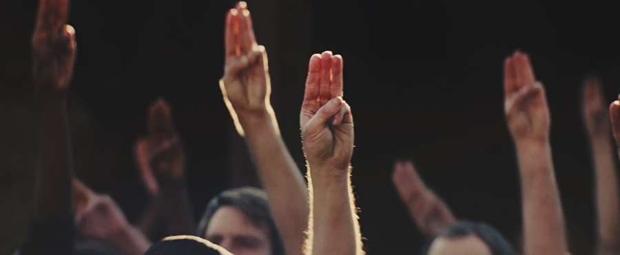 catching fire tributes holding hands